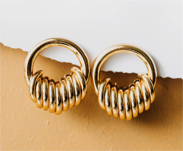 Pair of chunky ribbed gold hoop earrings